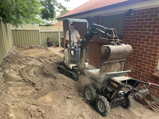 Continuing to remove earth from site using motorised wheelbarrow (3)